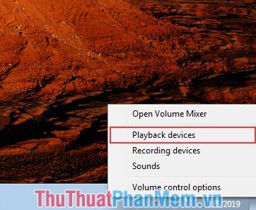Nhấn chuột phải vào biểu tượng loa và chọn Playback devives