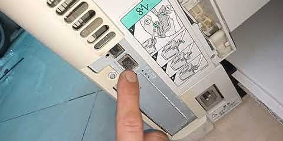 cách để giấy vào máy in