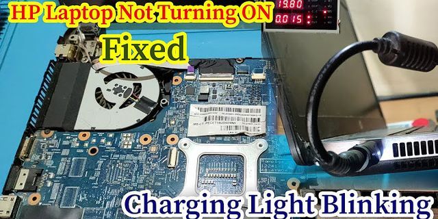 HP laptop won t turn on but charging light is on