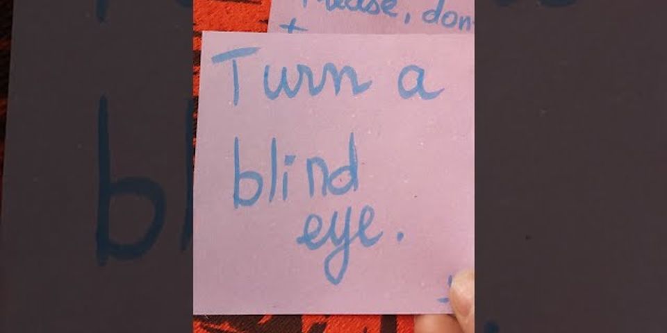 Turn a blind eye nghĩa là gì