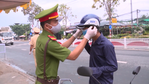 Vietnam policeman wearing mask for people.png